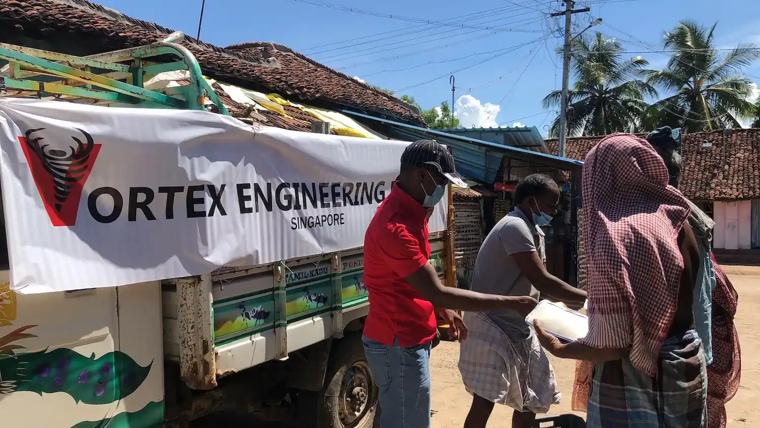 Vortex Giving Out Food to Villagers in India.